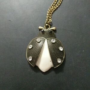 Gold Tone Clear Rhinestone Black and White Beetle Bug Pendant Necklace